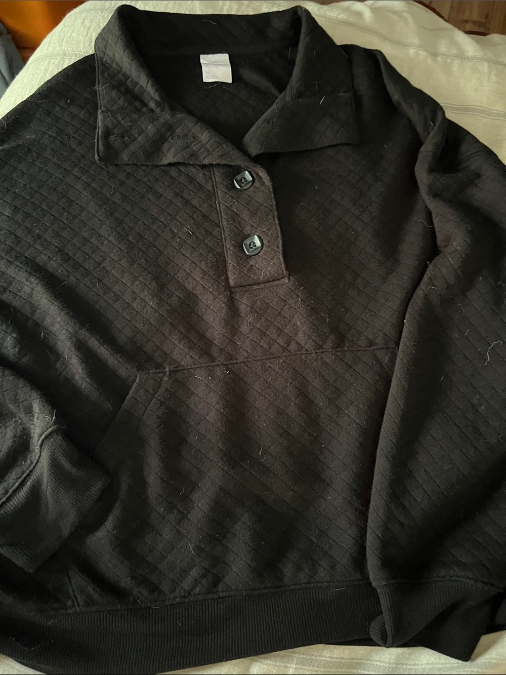 5/$10 item stars above Black Quilted Pullover with Two-Button Placket